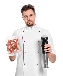 Photo of Chef holding sous vide cooker and meat in vacuum pack on white background