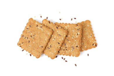 Photo of Cereal crackers with flax and sesame seeds isolated on white, top view