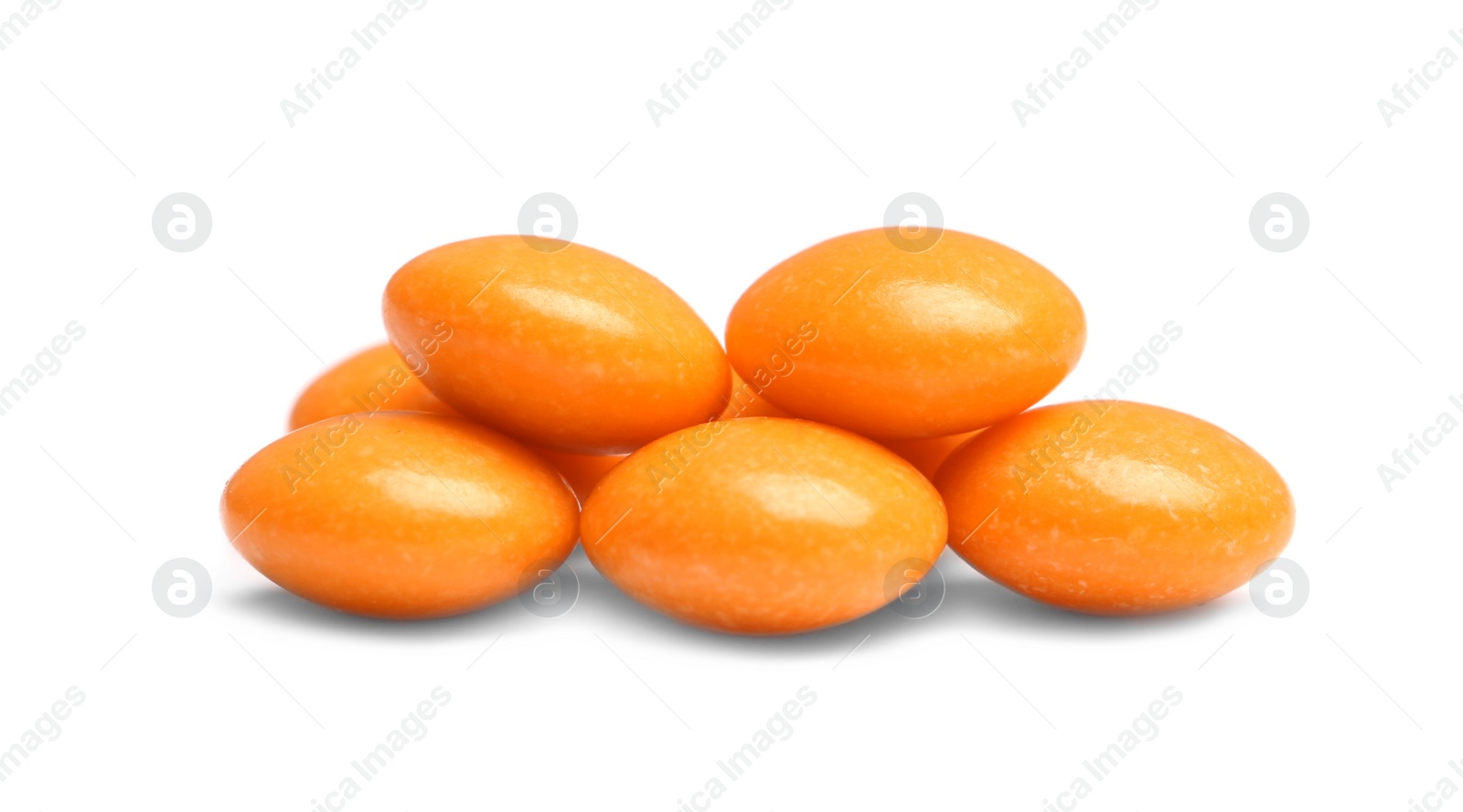 Photo of Pile of color pills on white background