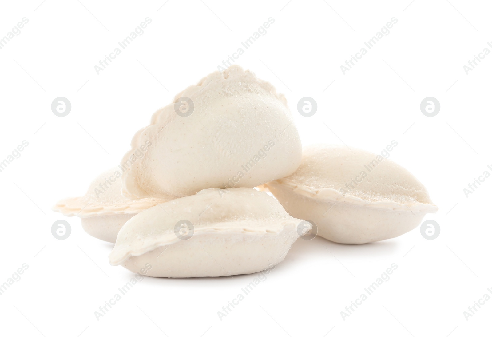 Photo of Heap of raw dumplings on white background