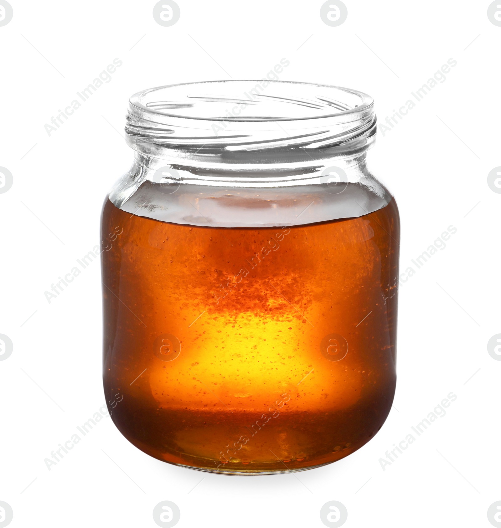 Photo of Jar with organic honey isolated on white