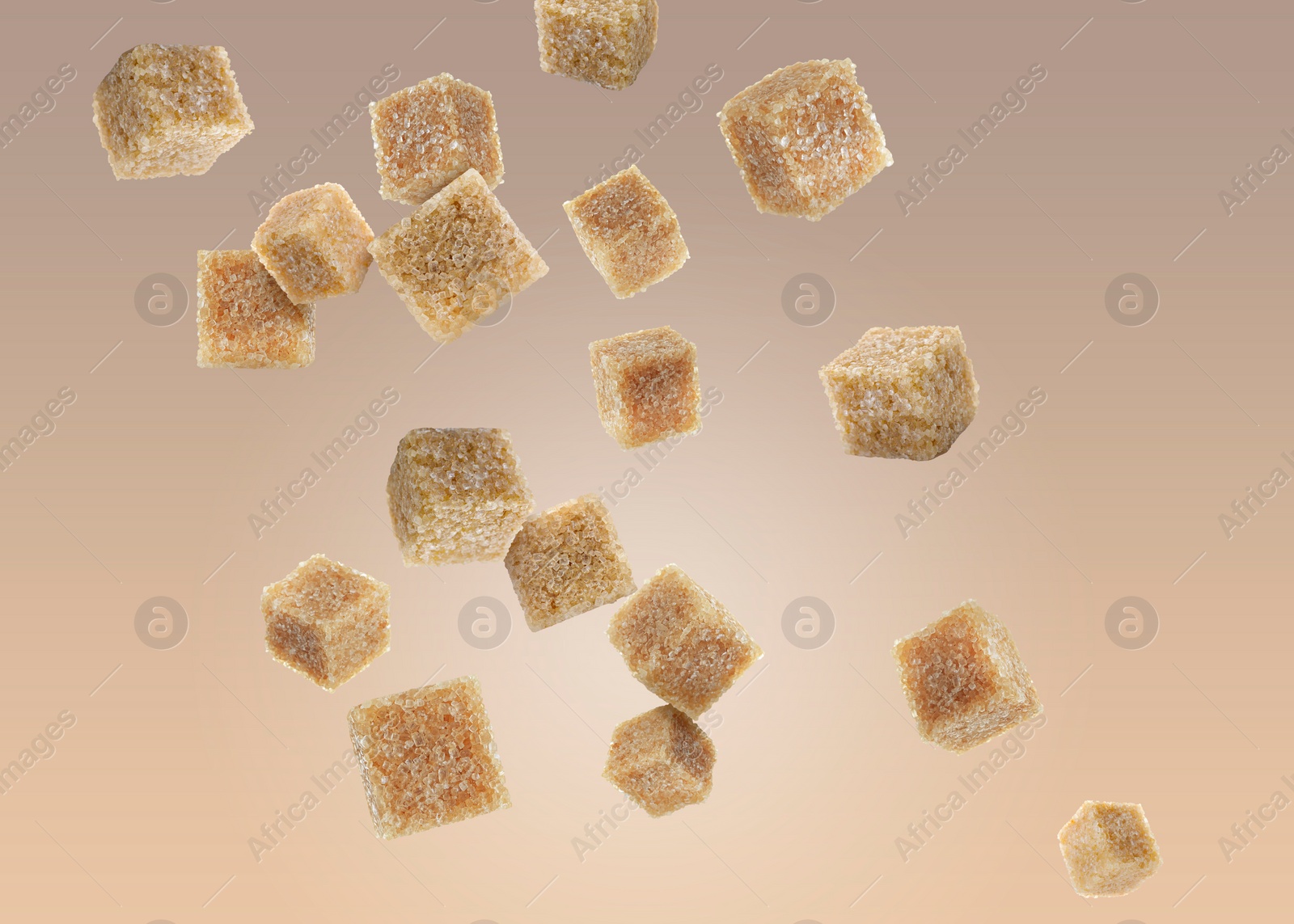 Image of Brown cane sugar cubes falling on color gradient background