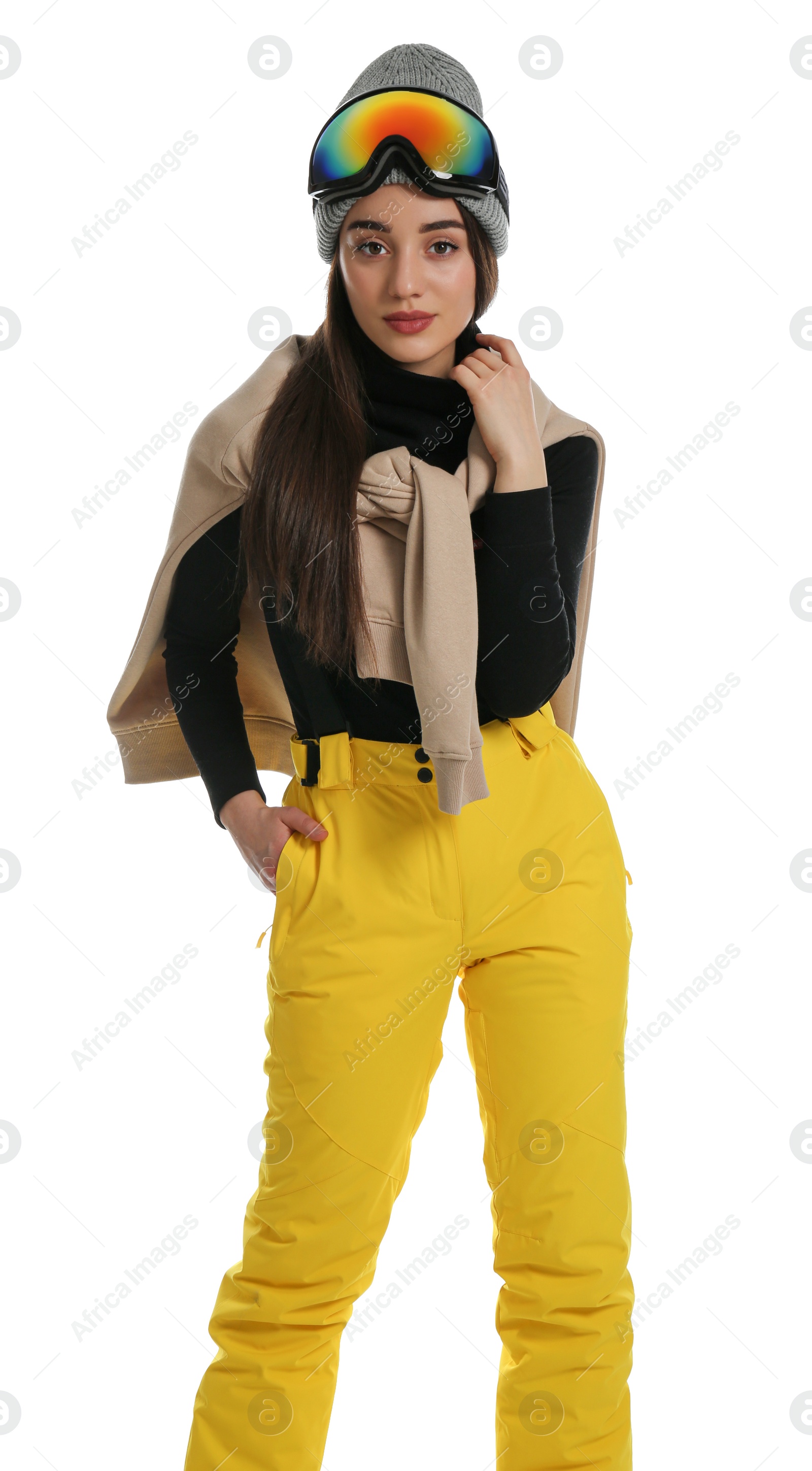 Photo of Woman wearing stylish winter sport clothes on white background