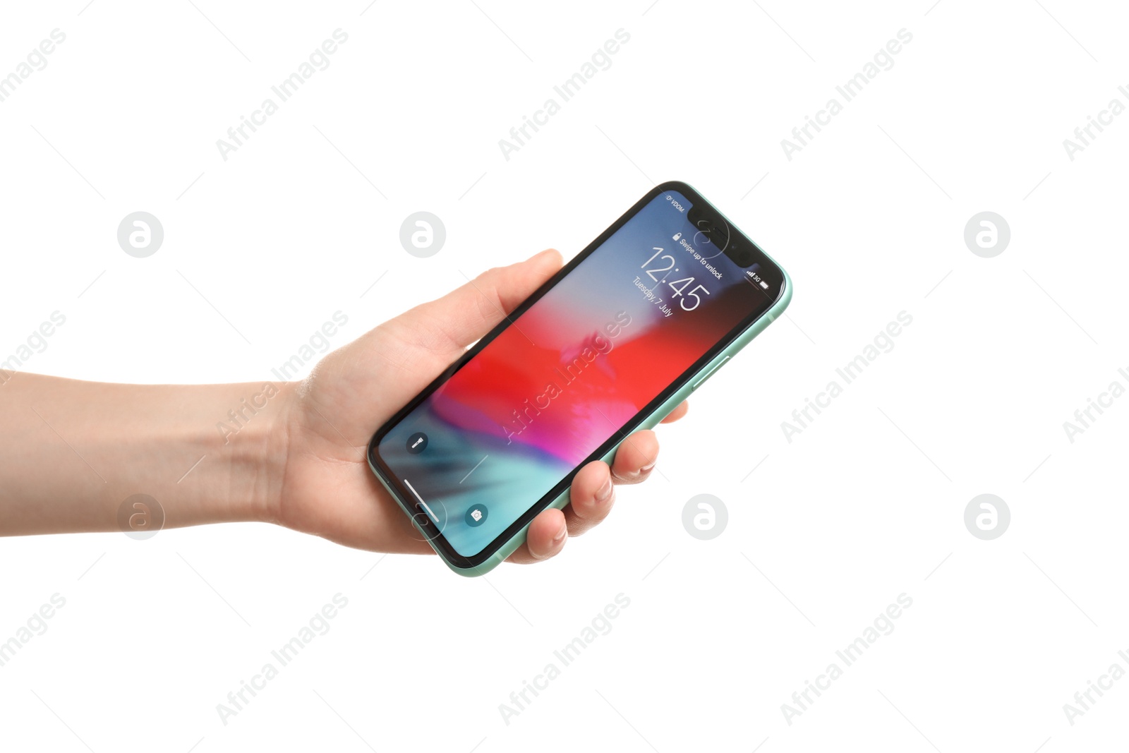 Photo of MYKOLAIV, UKRAINE - JUNE 9, 2020: Woman holding  iPhone X with locked screen on white background, closeup