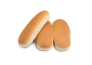 Tasty fresh buns for hot dogs on white background