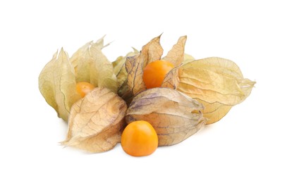 Photo of Many ripe physalis fruits with calyxes isolated on white