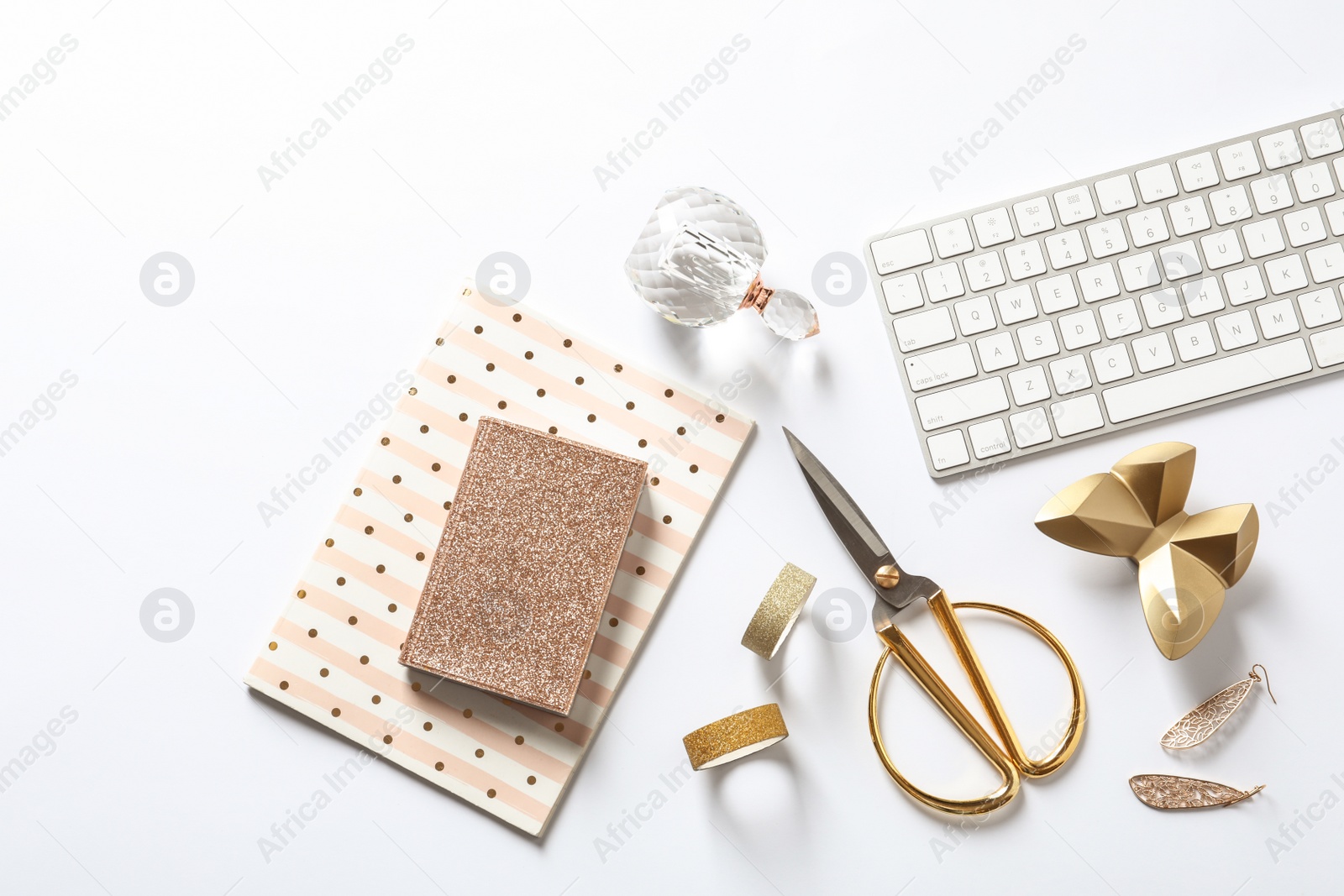 Photo of Composition with scissors, keyboard and notebooks on white background, top view