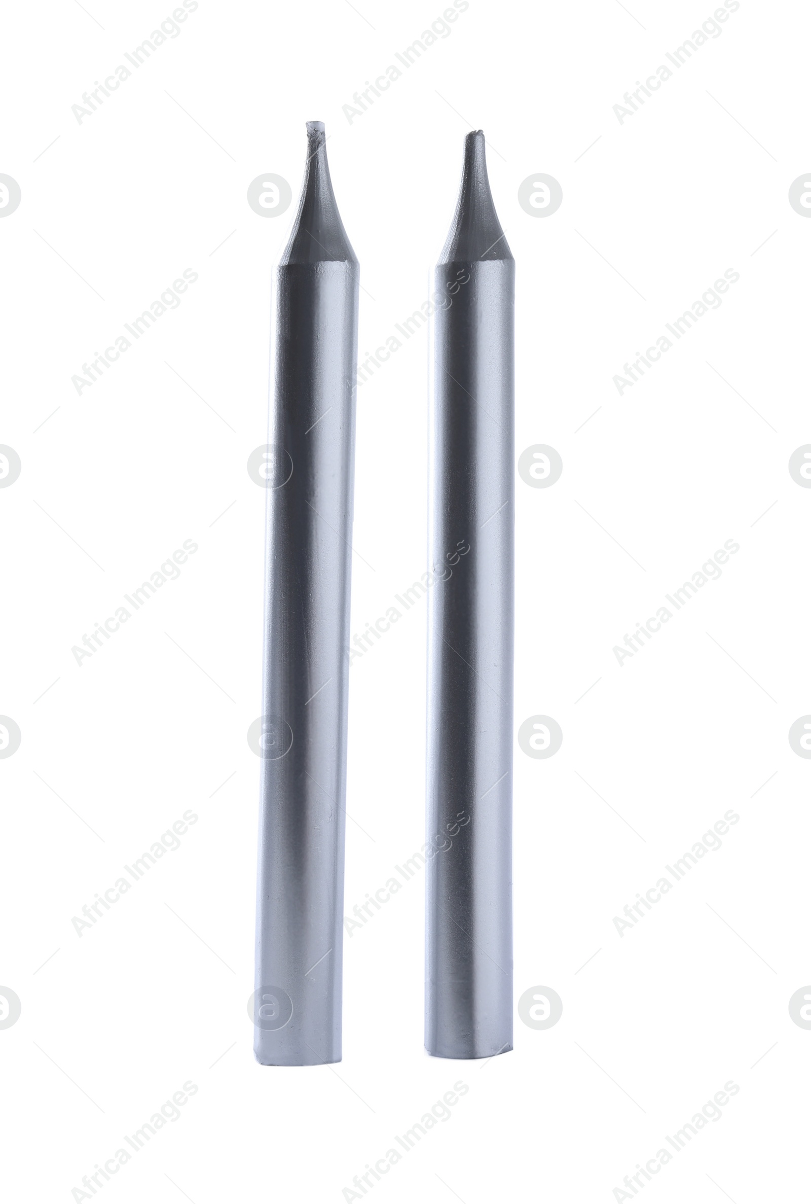 Photo of Thin silver birthday candles isolated on white