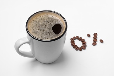 Photo of Cup of coffee and 0 percent made with beans on white background. Decaffeinated drink