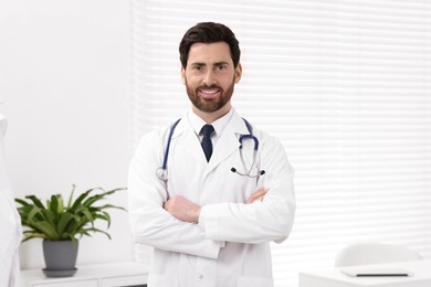 Portrait of medical consultant with stethoscope in clinic