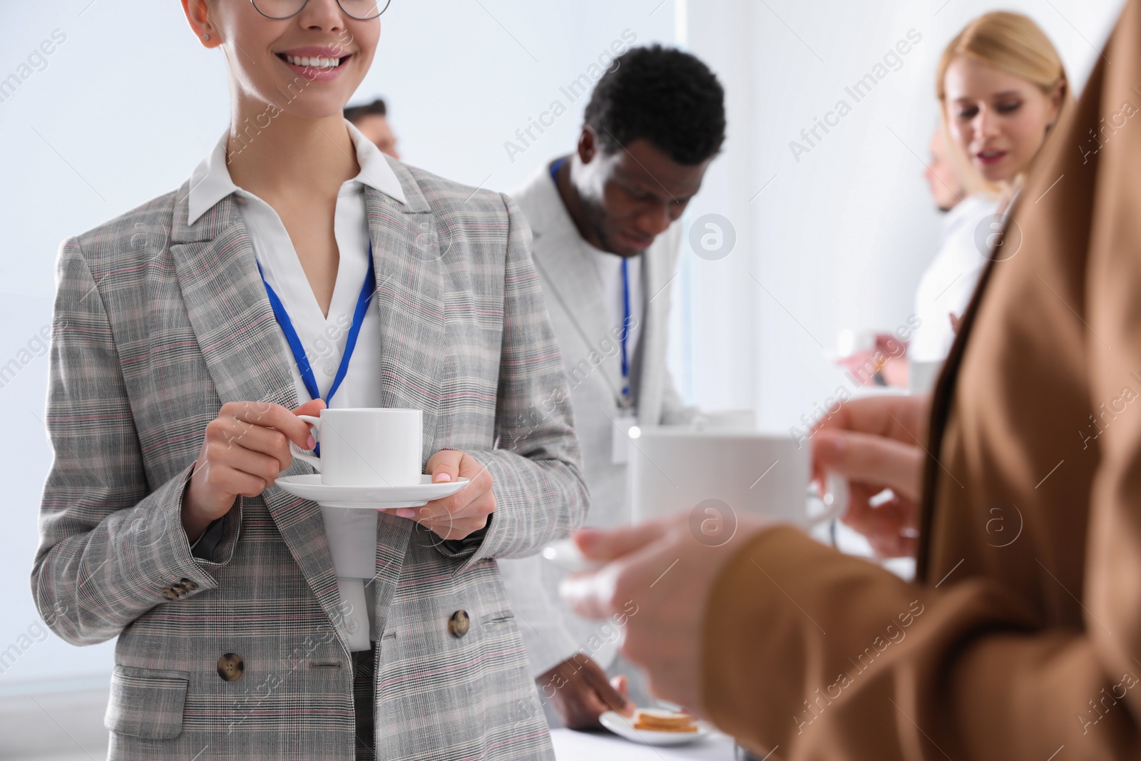 Photo of Group of people during coffee break, closeup