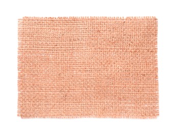 Piece of light pink burlap fabric on white background, top view