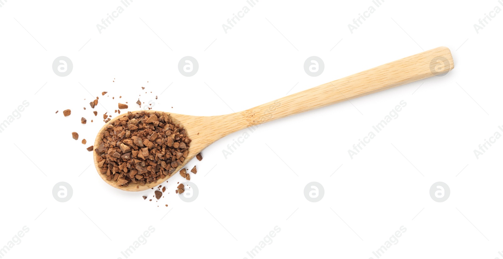 Photo of Spoon of chicory granules on white background, top view