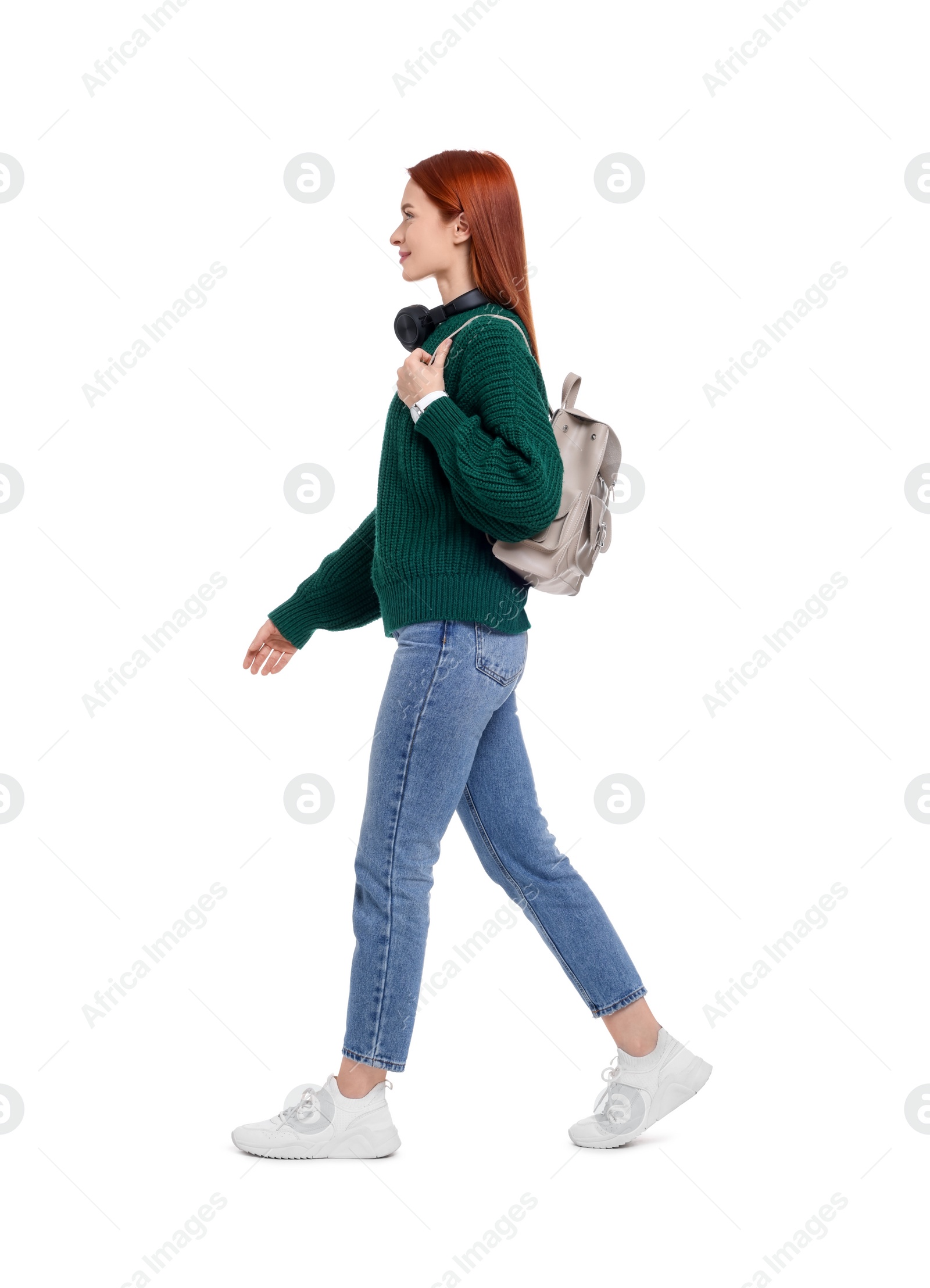 Photo of Woman with headphones and backpack on white background