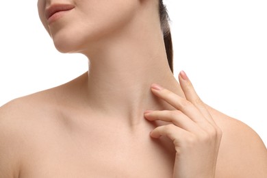 Woman touching her neck on white background, closeup