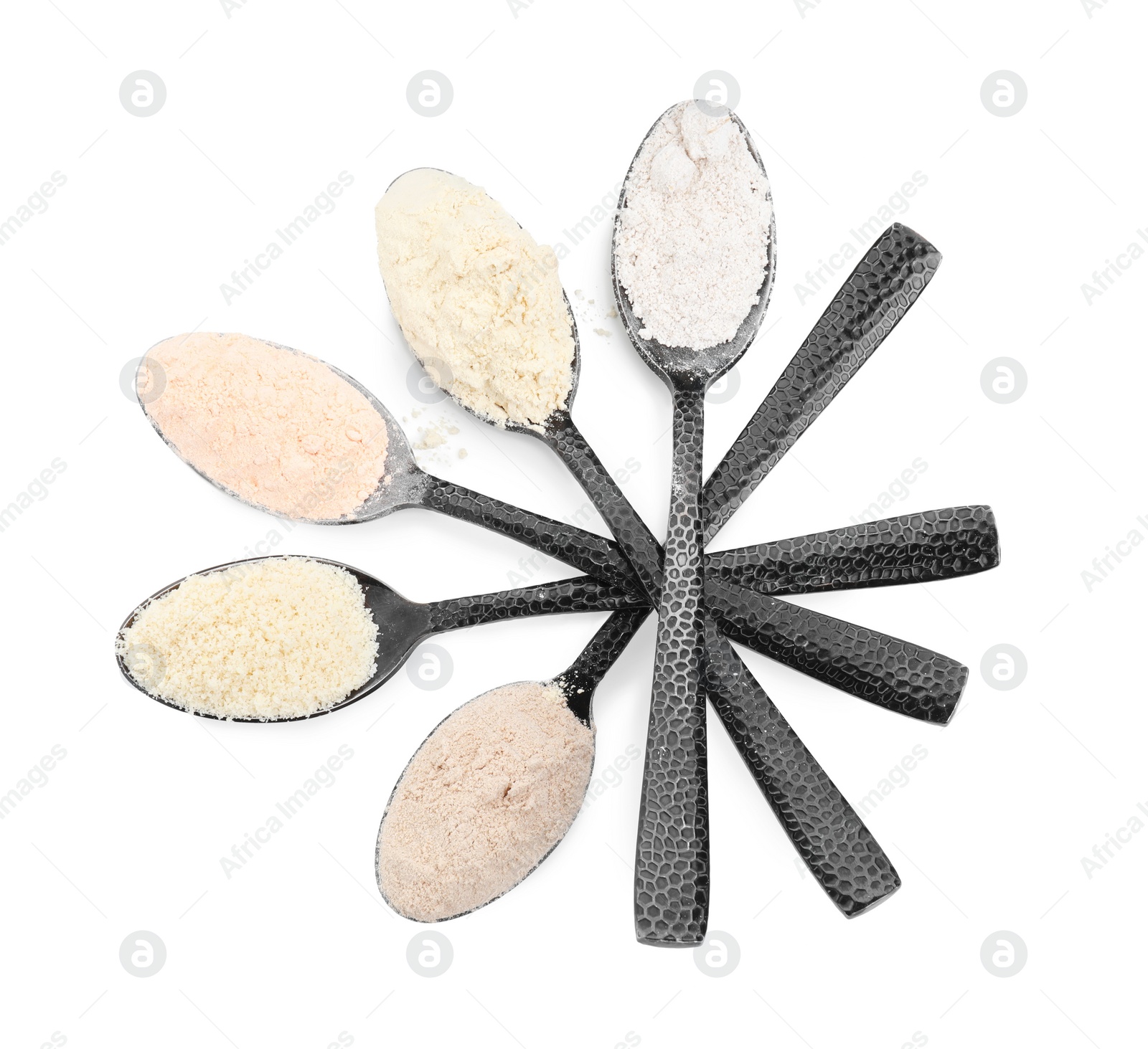 Photo of Spoons with different types of flours on white background