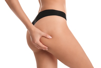 Photo of Closeup view of slim woman in underwear on white background. Cellulite problem concept