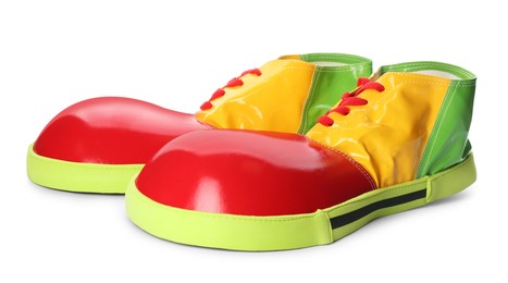 Photo of Pair of clown shoes isolated on white