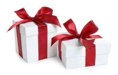 Photo of Boxes with Christmas gifts on white background