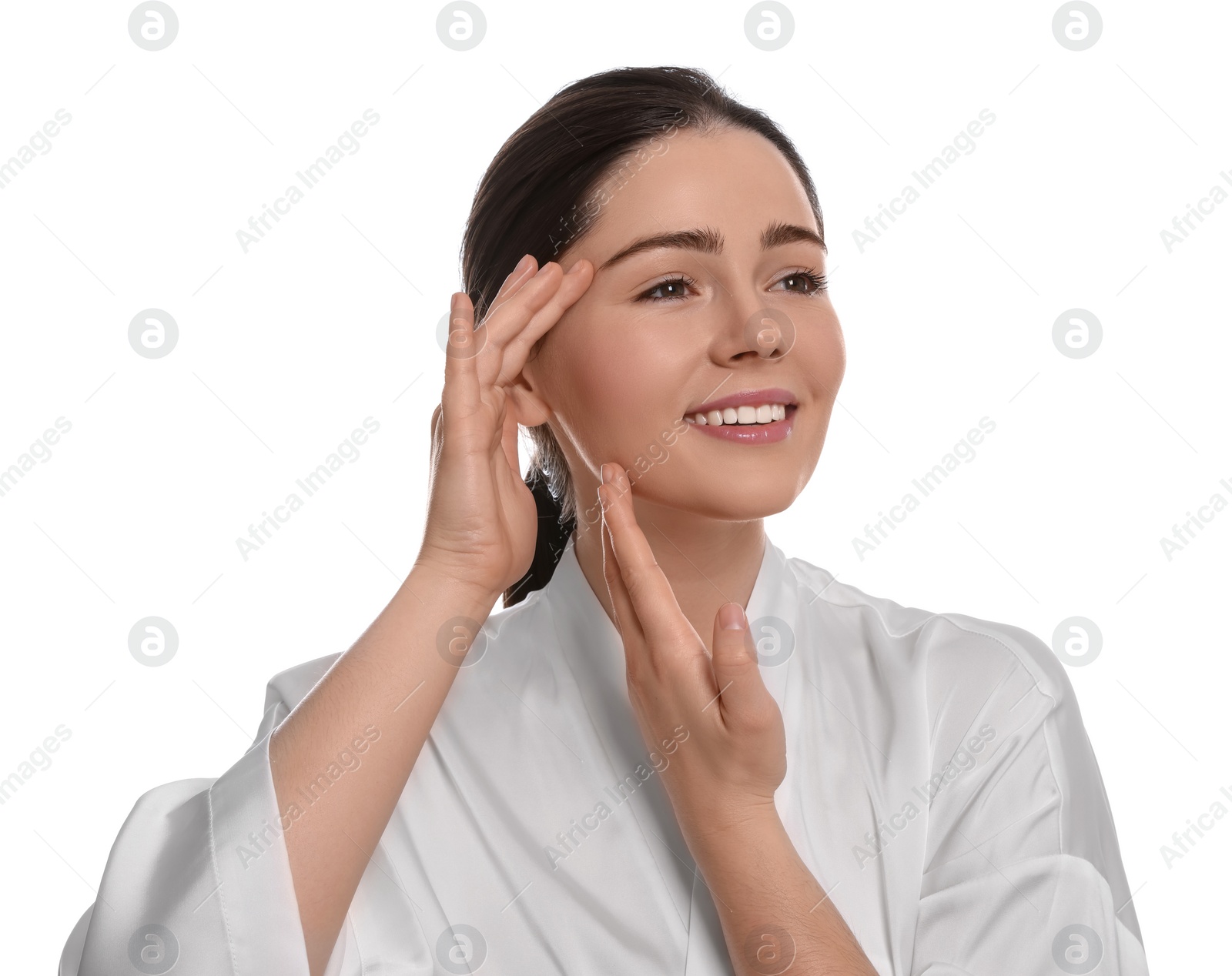 Photo of Young woman massaging her face on white background