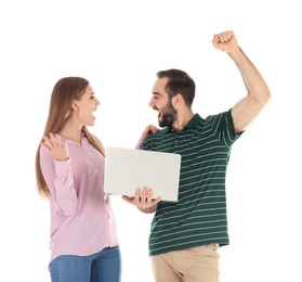 Photo of Emotional young people with laptop celebrating victory on white background