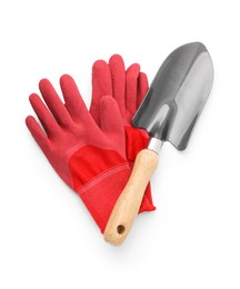 Photo of Gardening gloves and trowel isolated on white, top view