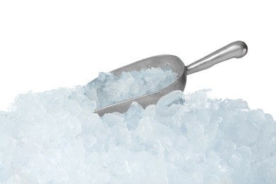 Heap of crushed ice and metal scoop on white background