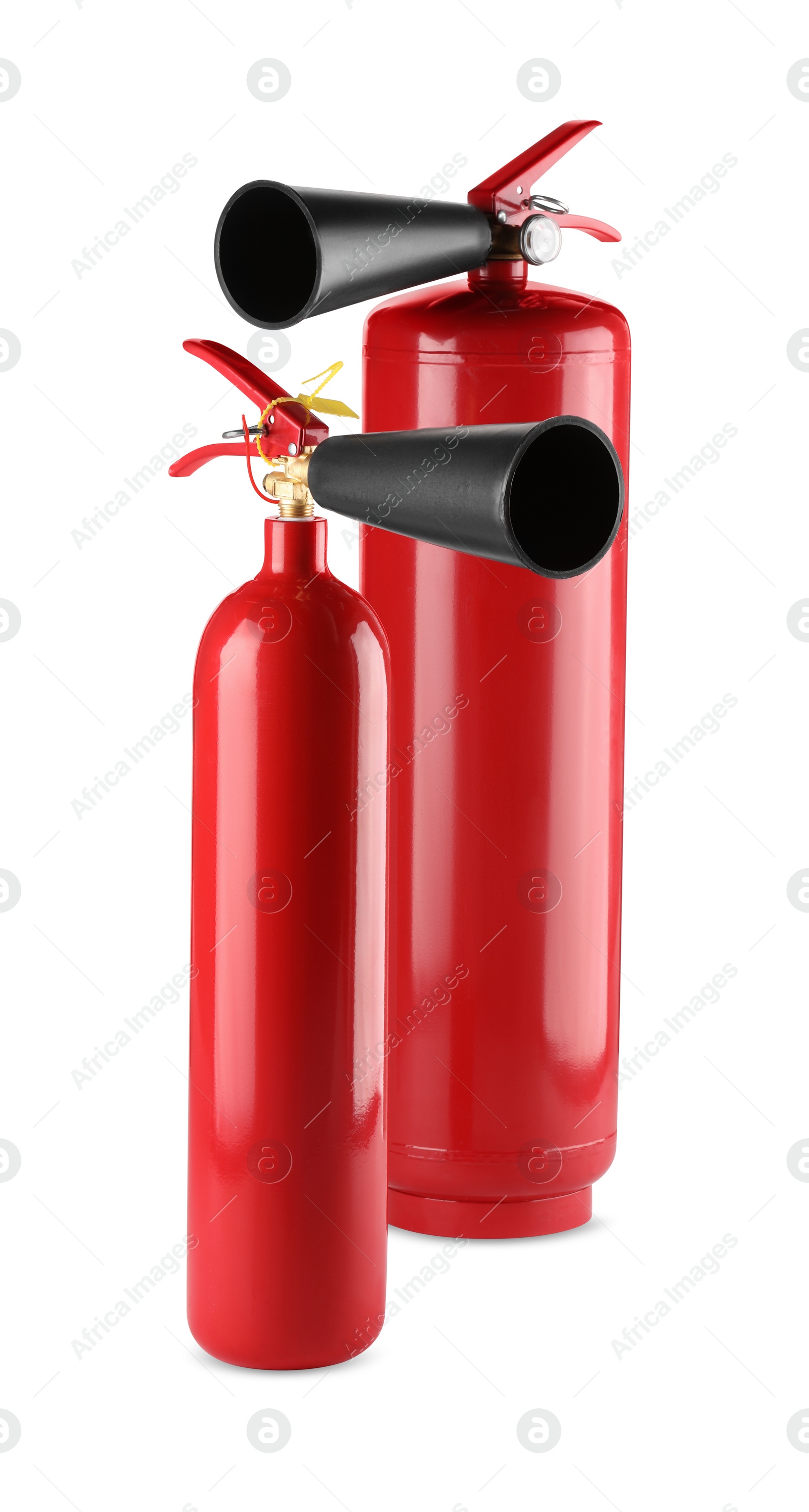 Photo of Two red fire extinguishers on white background