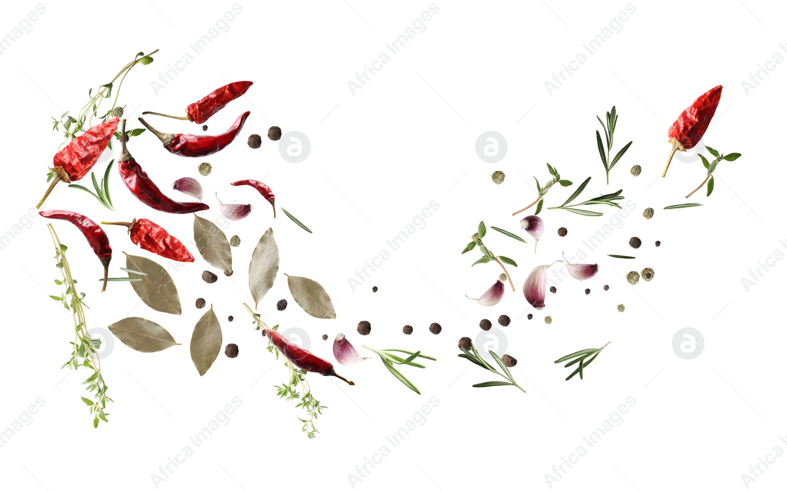 Image of Many different spices flying on white background