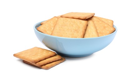 Photo of Tasty crackers in bowl isolated on white