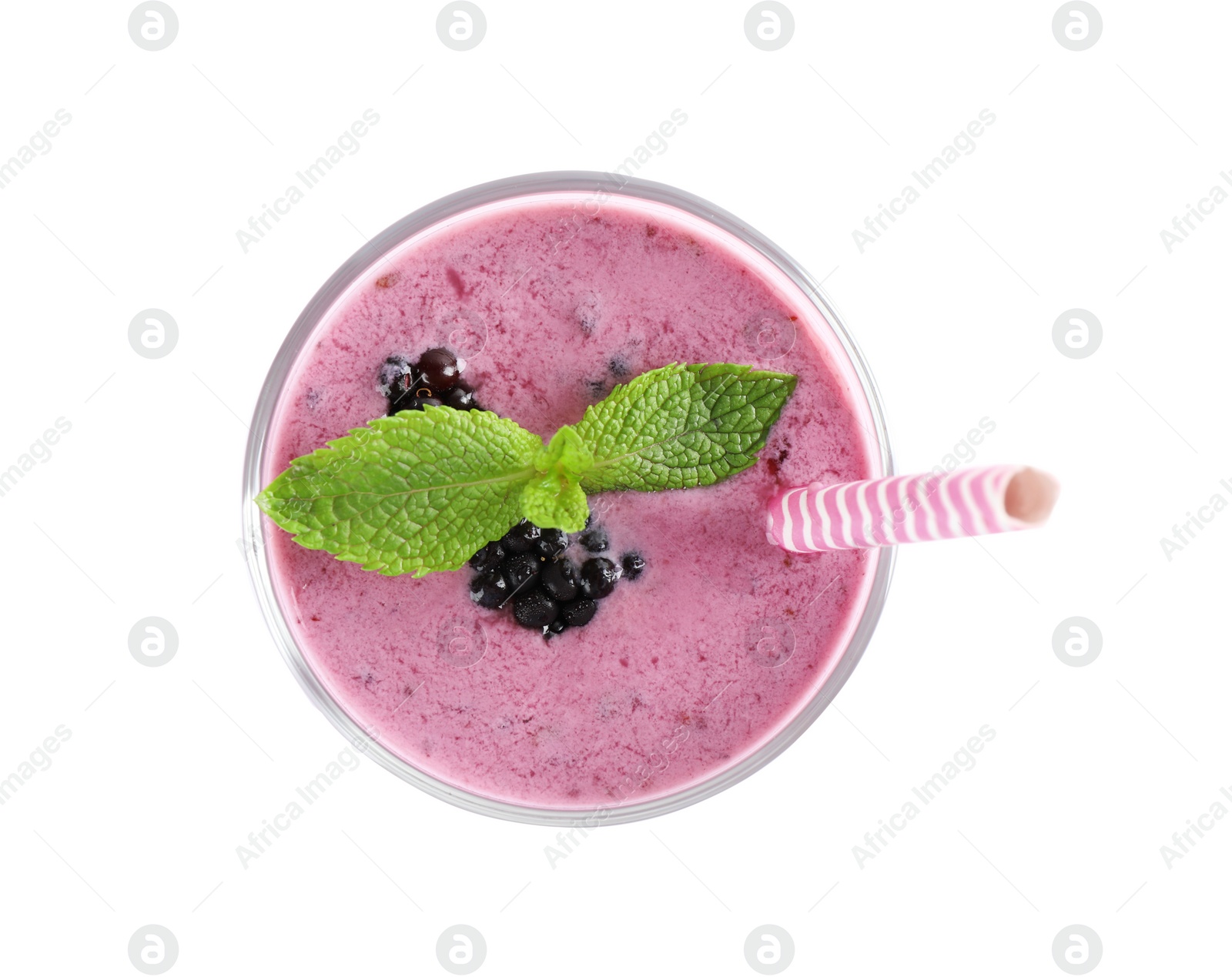 Photo of Delicious blackberry smoothie in glass on white background, top view