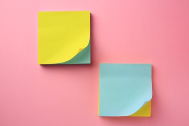 Photo of Blank paper notes on pink background, flat lay