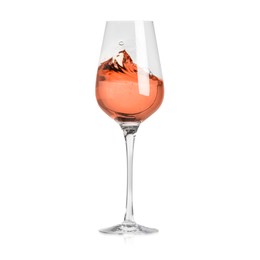 Rose wine splashing in glass on white background