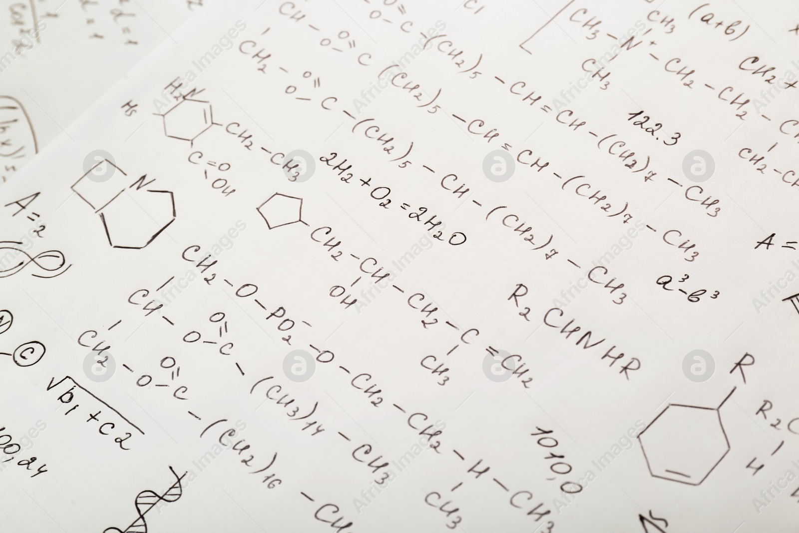 Photo of Sheet of paper with different chemical formulas, closeup