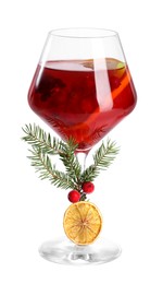 Photo of Christmas Sangria cocktail in glass isolated on white