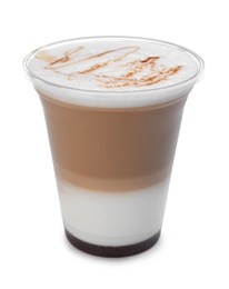 Photo of Plastic cup of tasty caramel macchiato on white background