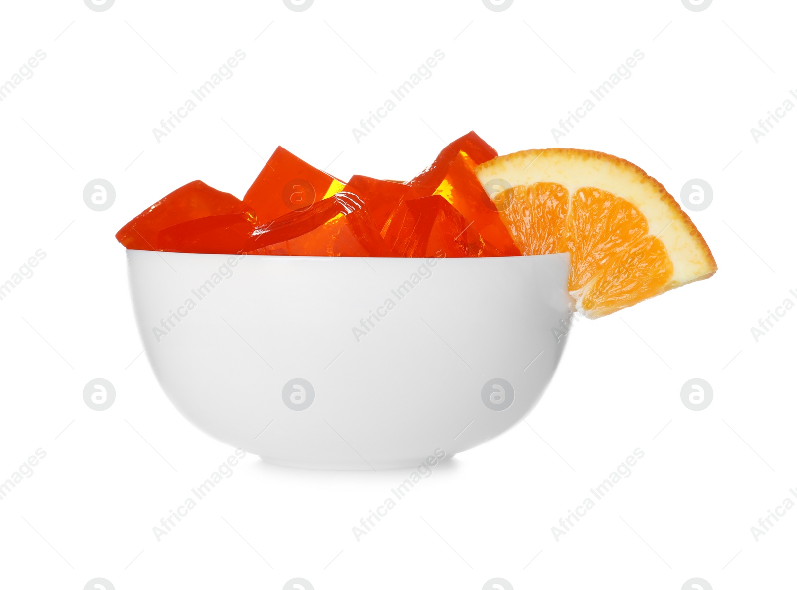 Photo of Bowl with tasty jelly cubes isolated on white