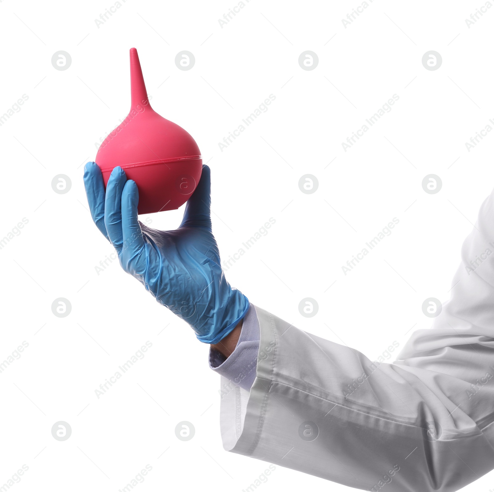 Photo of Doctor holding pink enema on white background, closeup