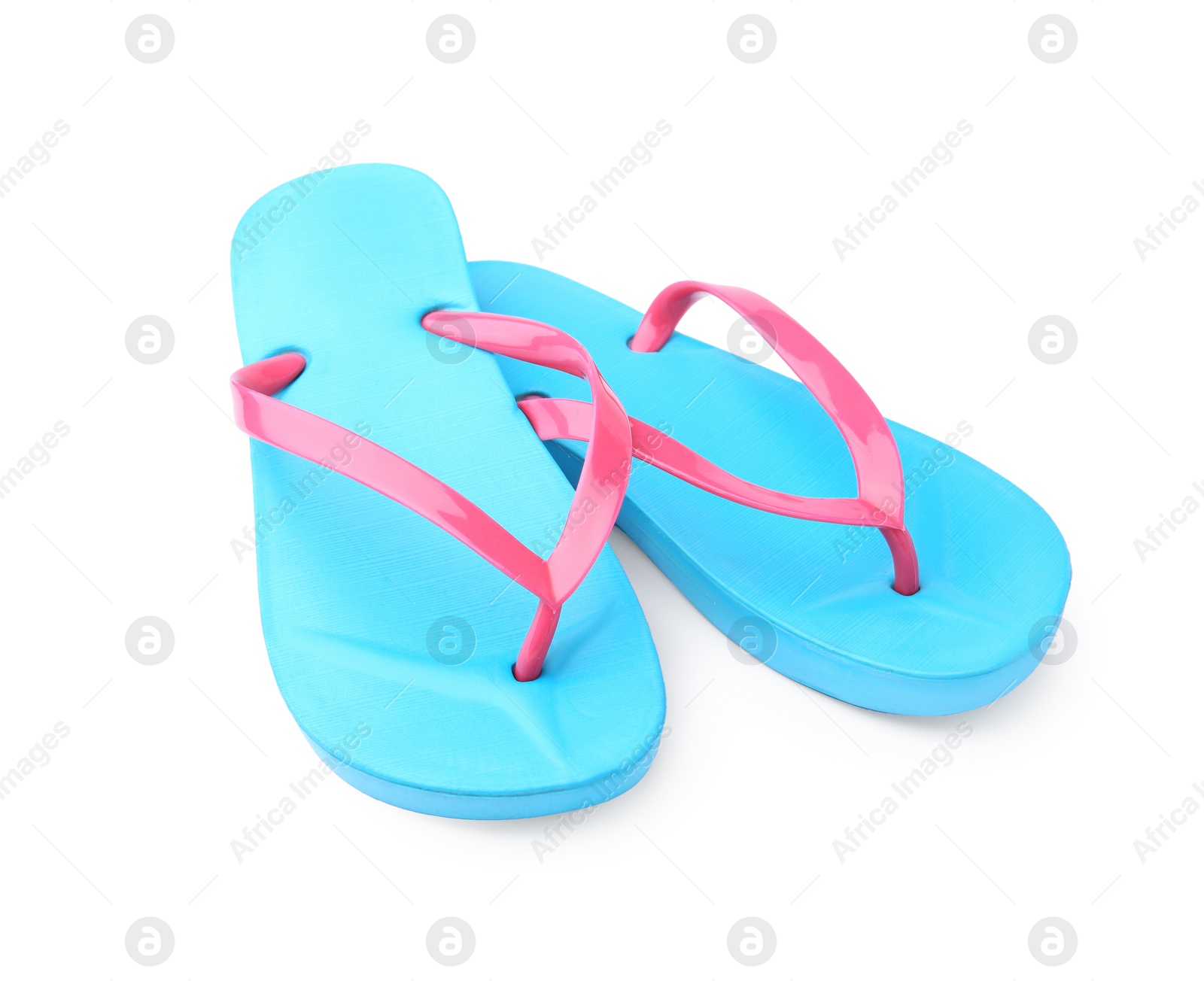 Photo of Stylish light blue flip flops isolated on white