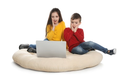 Little children using video chat on laptop, white background
