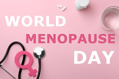 Image of World Menopause Day card. Female gender sign, stethoscope, pills and glass of water on pink background, flat lay