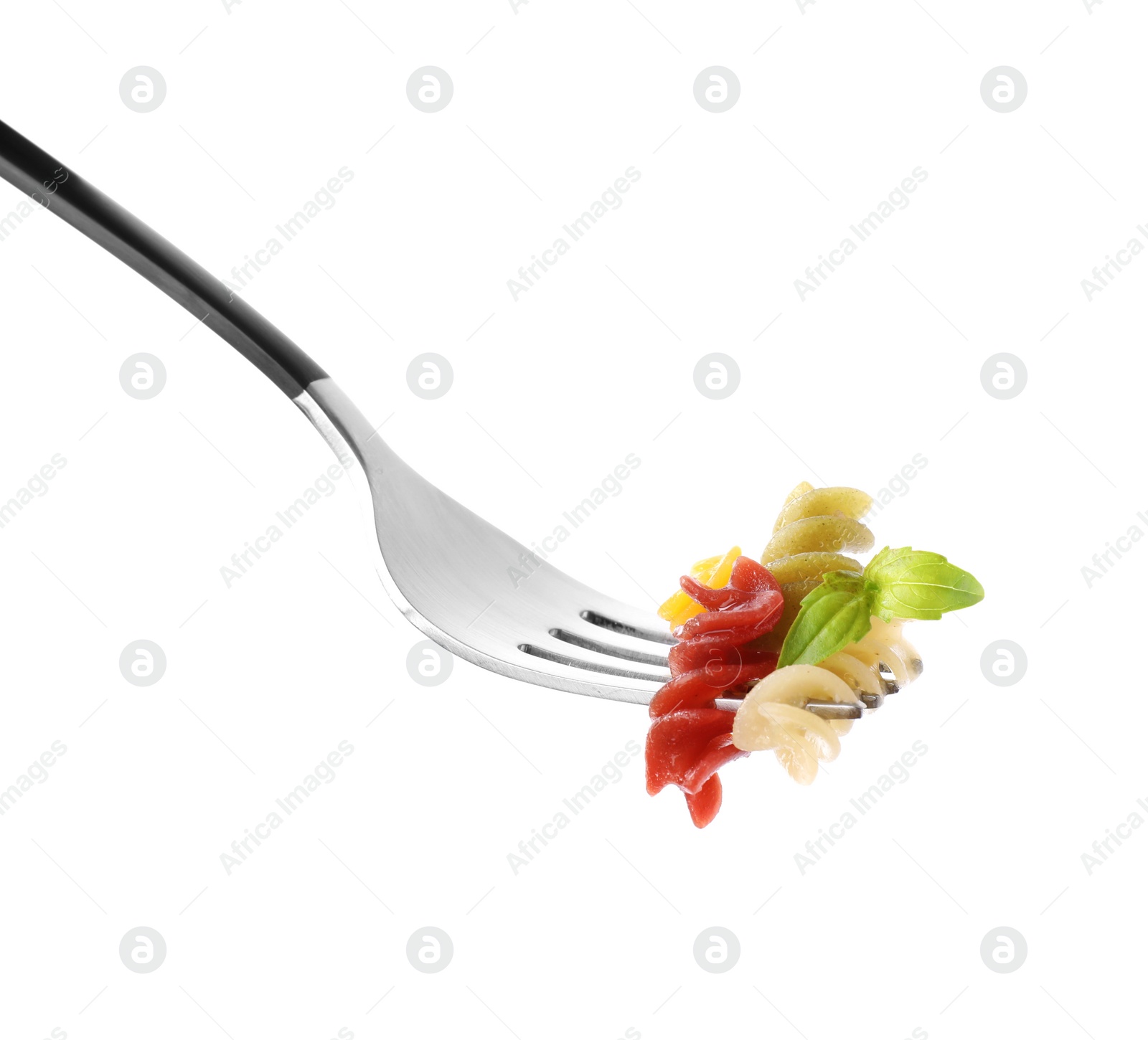 Photo of Fork with delicious spiraline pasta isolated on white