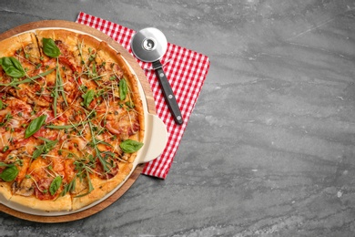 Photo of Flat lay composition with tasty homemade pizza and space for text on table