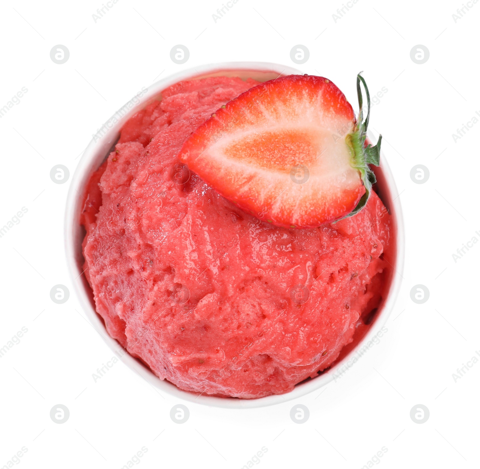 Photo of Delicious pink ice cream with strawberry in paper cup isolated on white, top view