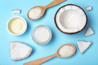 Flat lay composition with natural organic coconut oil on color background