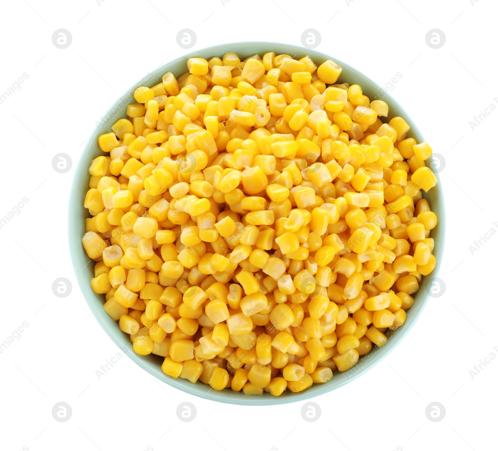 Photo of Delicious canned corn in bowl isolated on white, top view