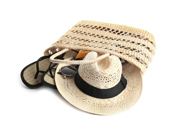 Set of beach accessories on white background