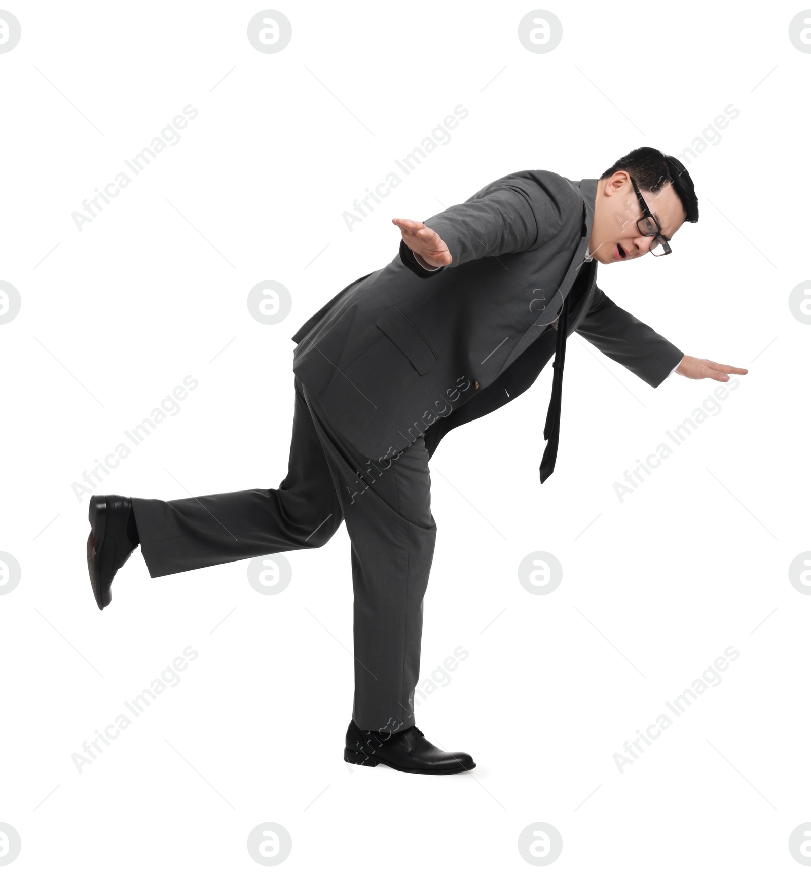 Photo of Businessman in suit posing on white background