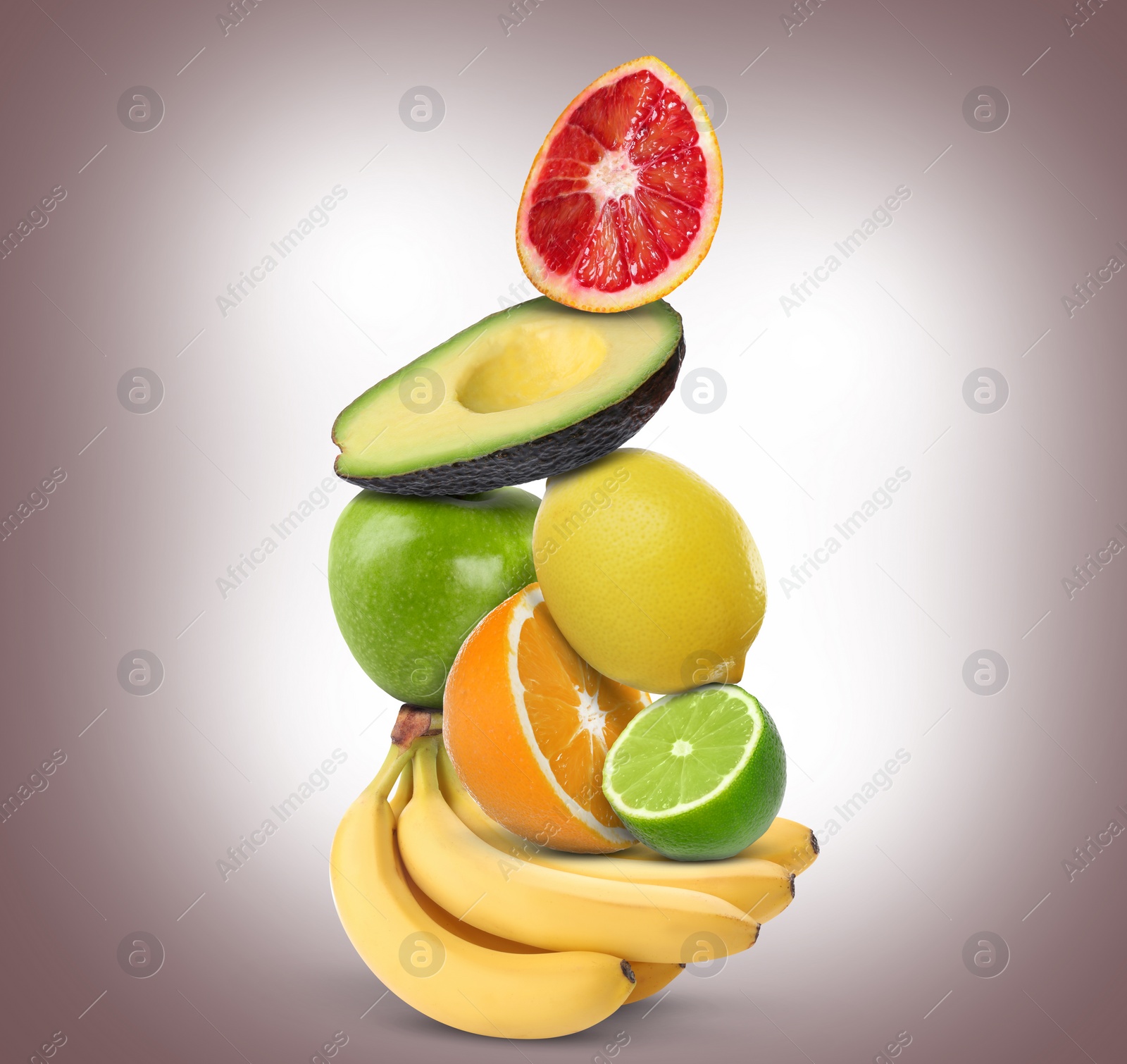 Image of Stack of different fresh fruits on pale brown gradient background