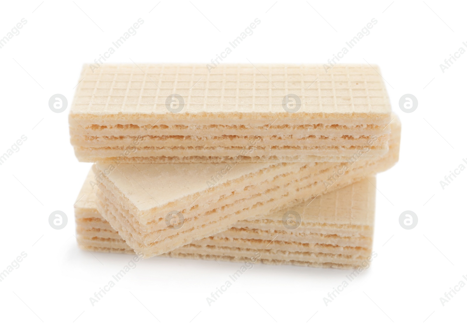 Photo of Delicious crispy wafers on white background. Sweet food